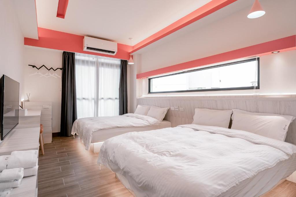 Postel nebo postele na pokoji v ubytování Sweet Summer Homestay