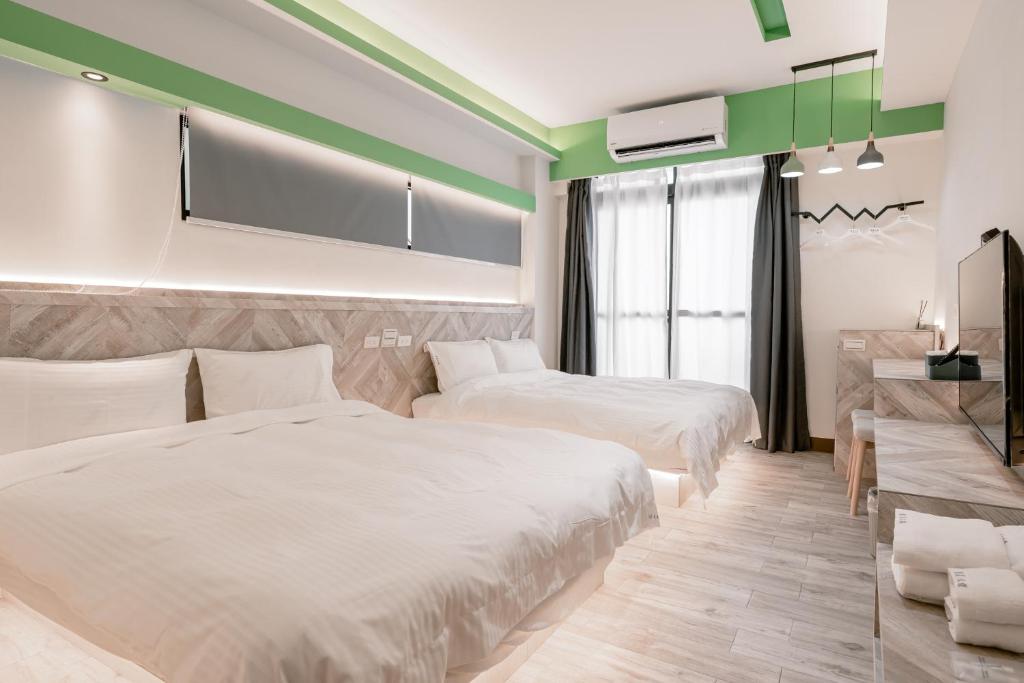 Postel nebo postele na pokoji v ubytování Sweet Summer Homestay