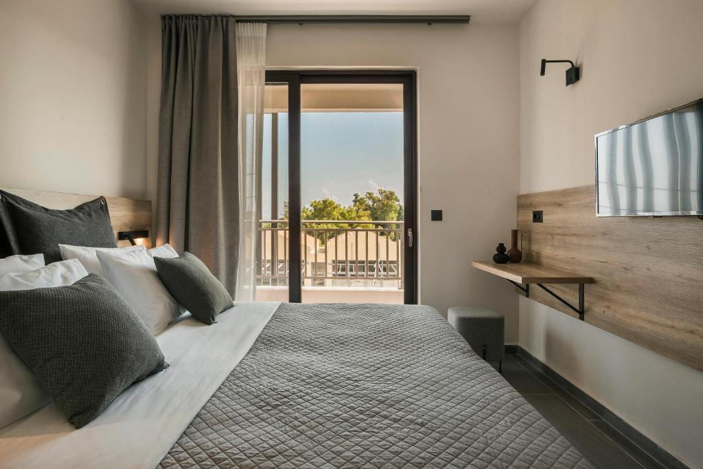 Postel nebo postele na pokoji v ubytování Skala Hotel