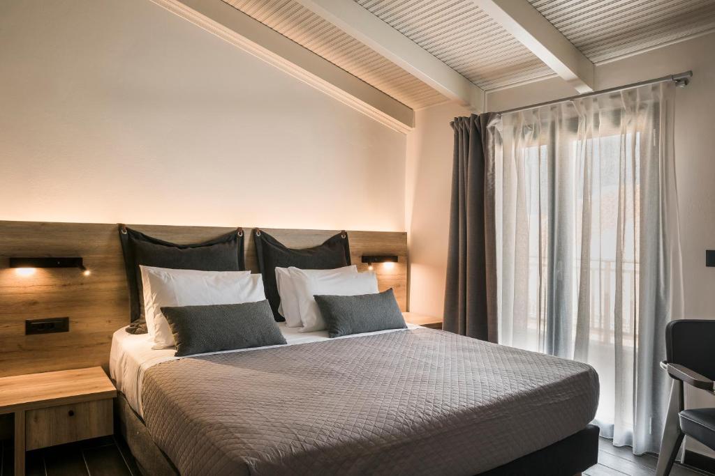 Postel nebo postele na pokoji v ubytování Skala Hotel