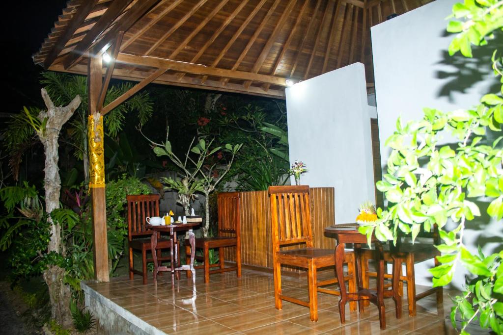 Zahrada ubytování Kurnia Guest House & Spa