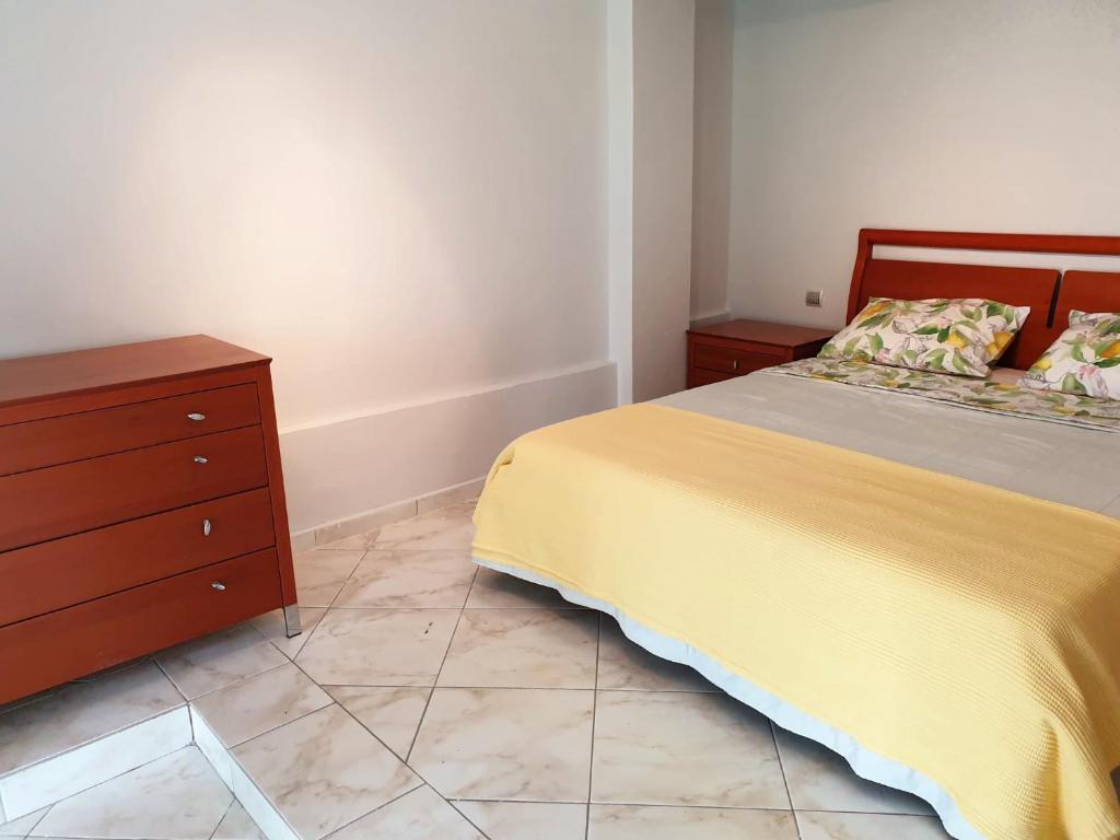 Postel nebo postele na pokoji v ubytování HOUSE SUITES DOMAINE