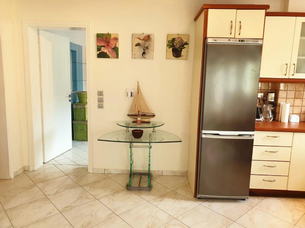 Kuchyň nebo kuchyňský kout v ubytování HOUSE SUITES DOMAINE