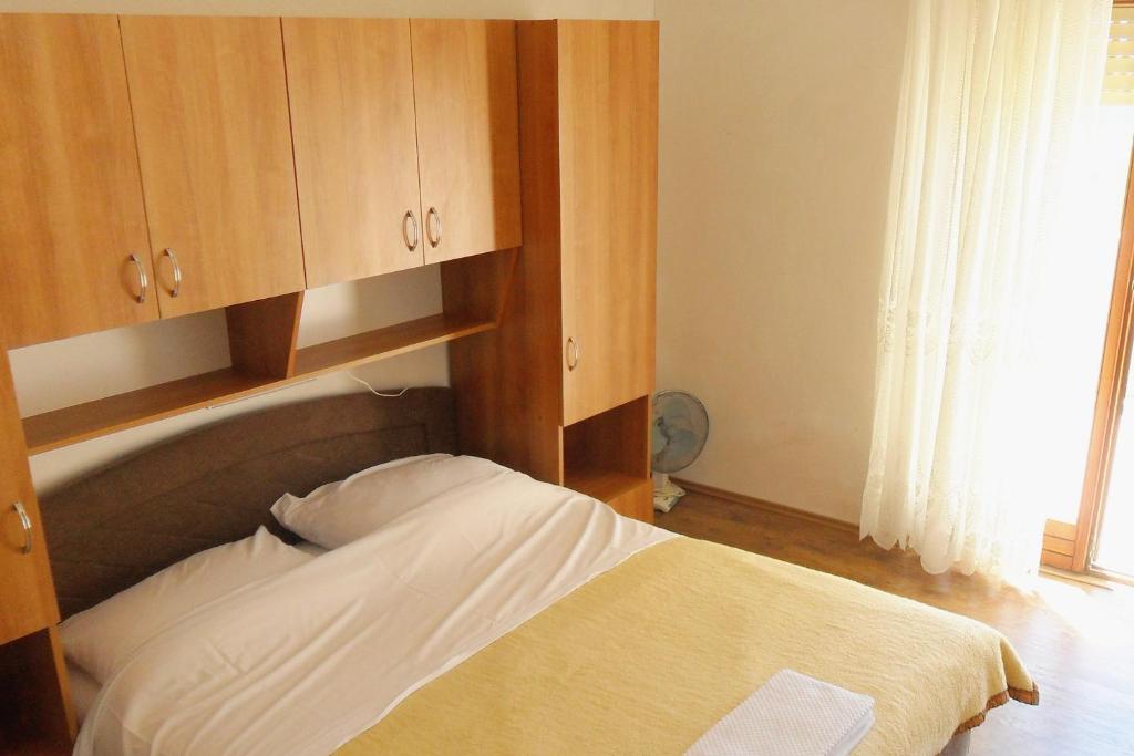 Postel nebo postele na pokoji v ubytování Apartment Suha Punta 5050a