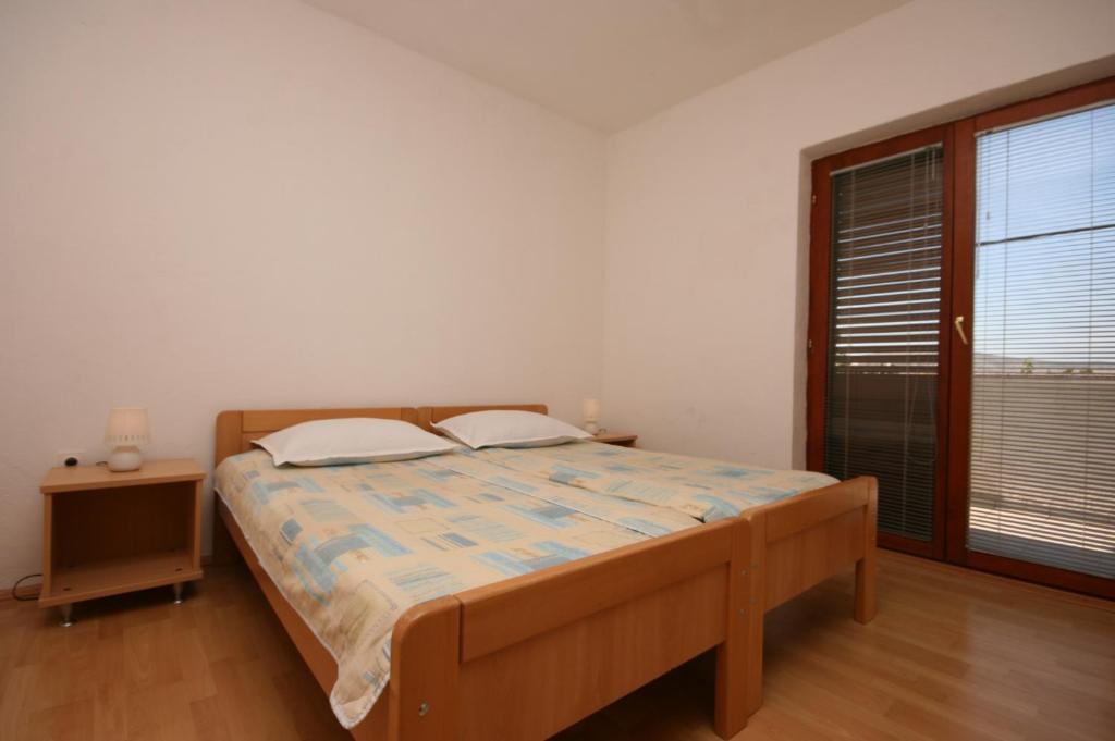 Posteľ alebo postele v izbe v ubytovaní Apartment Starigrad 6606b