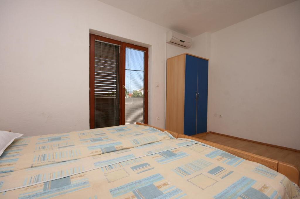 Posteľ alebo postele v izbe v ubytovaní Apartment Starigrad 6606b