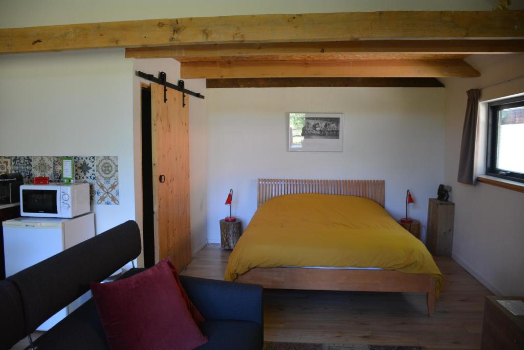 Postel nebo postele na pokoji v ubytování Tijdzat
