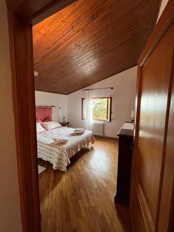 Postel nebo postele na pokoji v ubytování Casa Lastri