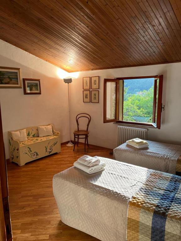 Postel nebo postele na pokoji v ubytování Casa Lastri