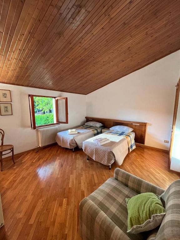 Postel nebo postele na pokoji v ubytování Casa Lastri