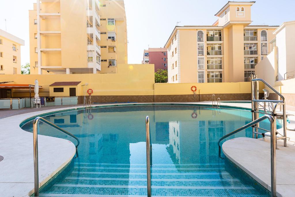 Bazén v ubytovaní VER7 - ESTUDIO, Wifi, Fire Stick Amazon, Terraza, Vistas al mar, Piscina alebo v jeho blízkosti