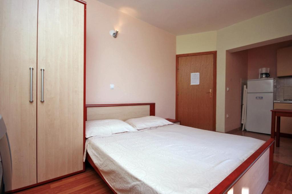 Postel nebo postele na pokoji v ubytování Studio Duce 4852b