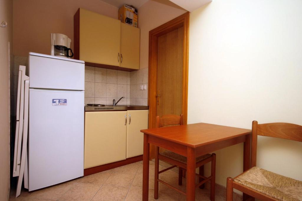 Kuchyň nebo kuchyňský kout v ubytování Studio Duce 4852b