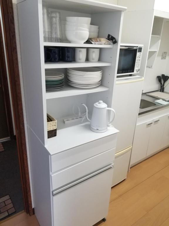 Kuchyň nebo kuchyňský kout v ubytování Guest House Tatara