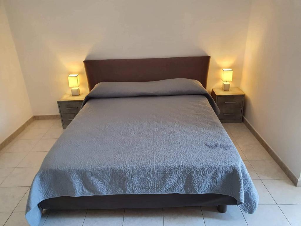 Postel nebo postele na pokoji v ubytování Stella Maris