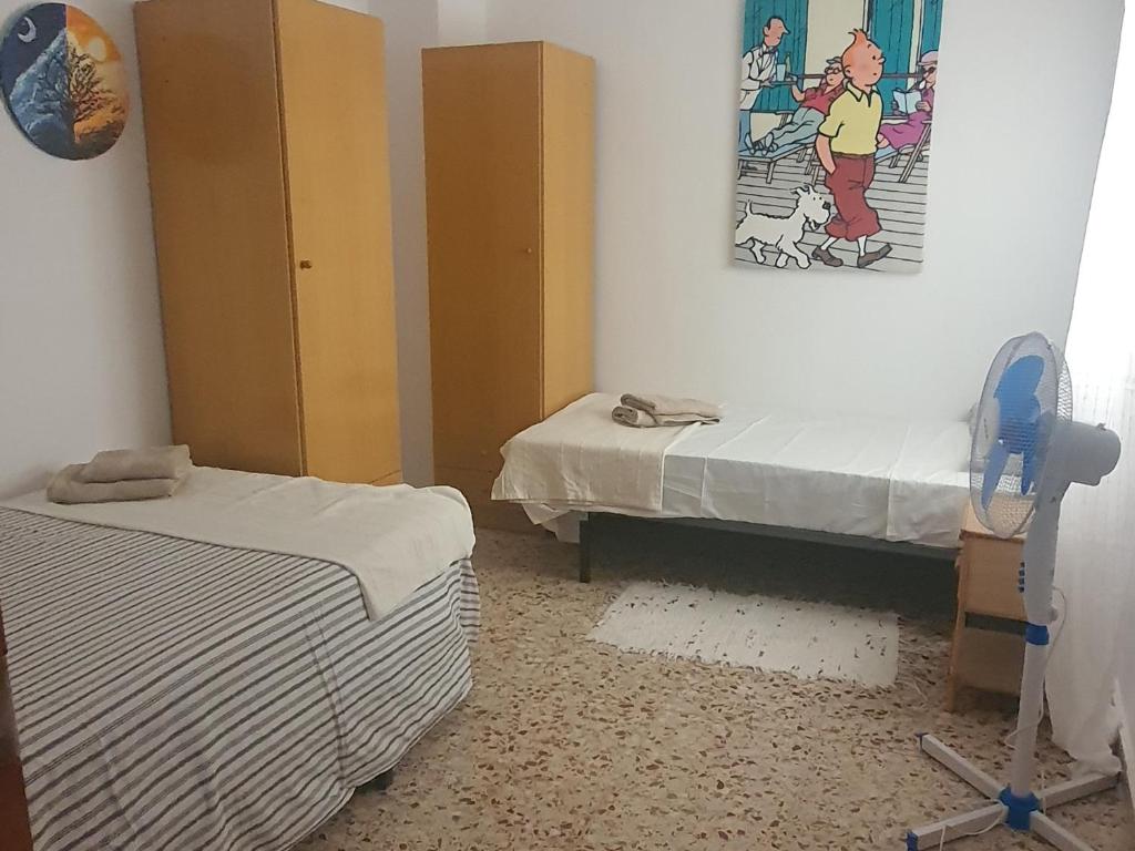 Postel nebo postele na pokoji v ubytování La Chirrichana 2
