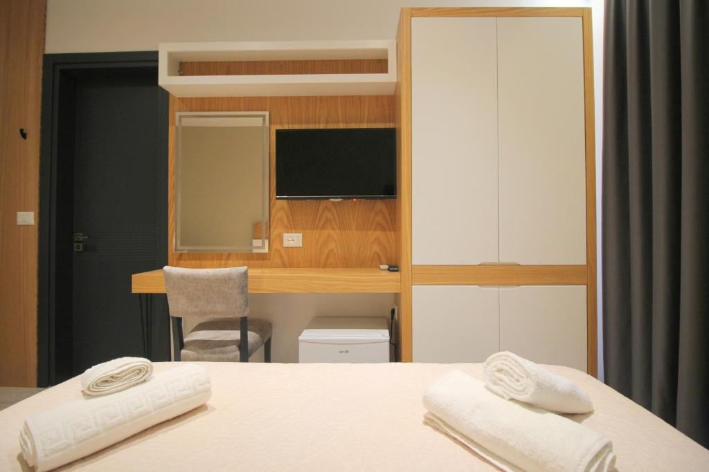 Postel nebo postele na pokoji v ubytování F&J Hotel