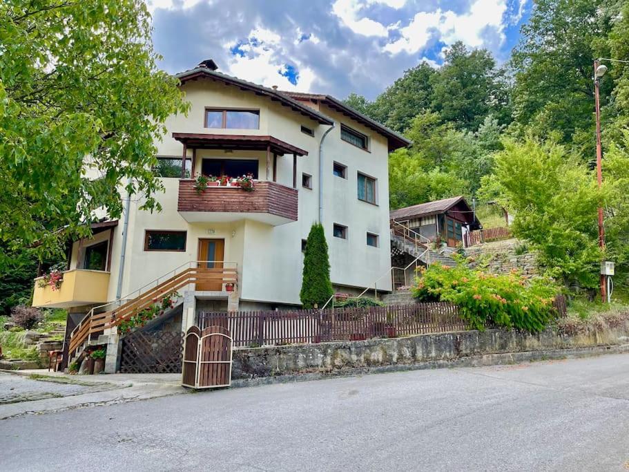 a house on the side of a street at Sun House in Tryavna