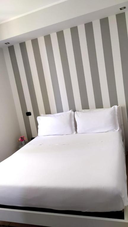 Postel nebo postele na pokoji v ubytování Il Roseto