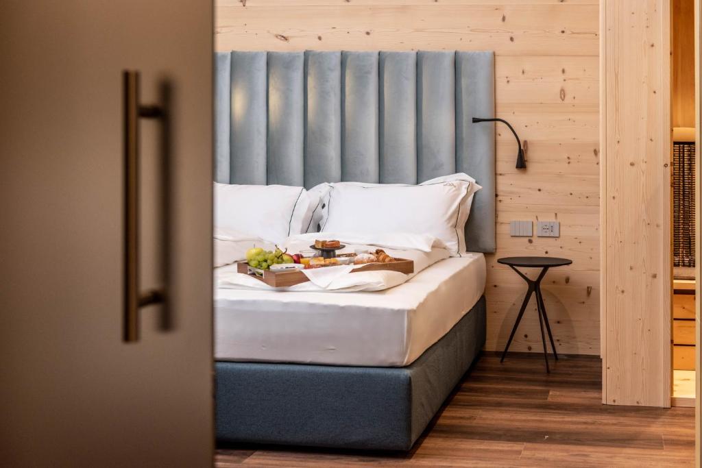 Voodi või voodid majutusasutuse Calepina Alpine Suite toas