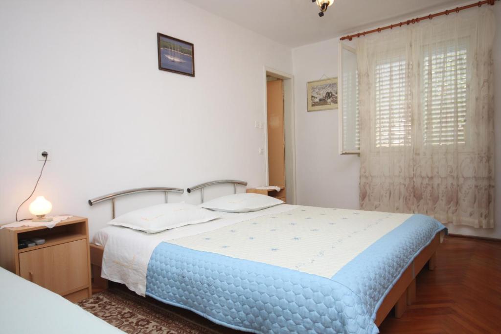 Łóżko lub łóżka w pokoju w obiekcie Rooms by the sea Sucuraj, Hvar - 6734