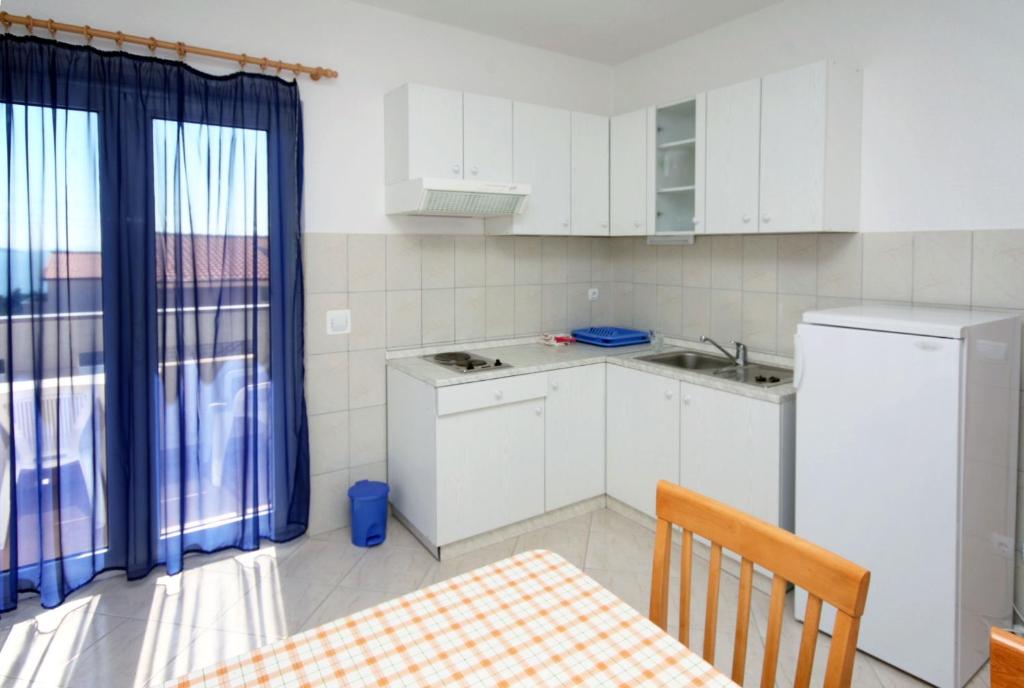 Kuchyňa alebo kuchynka v ubytovaní Apartments with WiFi Seget Vranjica, Trogir - 4870