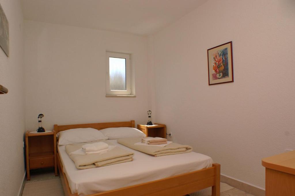 Posteľ alebo postele v izbe v ubytovaní Rooms by the sea Slano, Dubrovnik - 5205