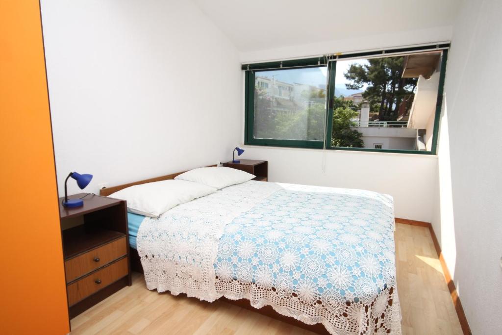 Posteľ alebo postele v izbe v ubytovaní Apartments with a parking space Makarska - 6691