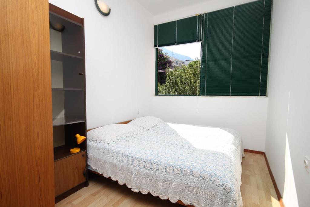 Posteľ alebo postele v izbe v ubytovaní Apartments with a parking space Makarska - 6691