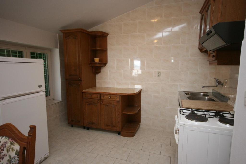 Kuchyň nebo kuchyňský kout v ubytování Apartments by the sea Turanj, Biograd - 6445
