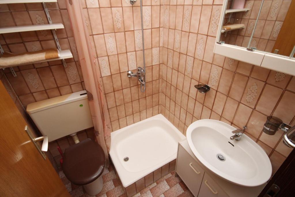 Koupelna v ubytování Apartments and rooms by the sea Povljana, Pag - 6476