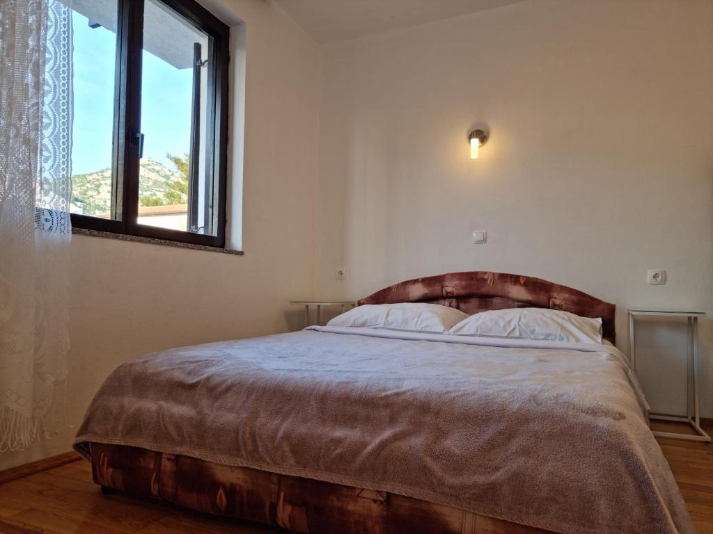Posteľ alebo postele v izbe v ubytovaní Apartments by the sea Starigrad, Paklenica - 6621