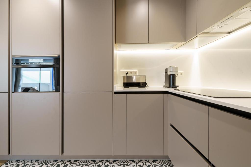 Kuchyňa alebo kuchynka v ubytovaní LUXURY APARTMENT Benalmadena Costa