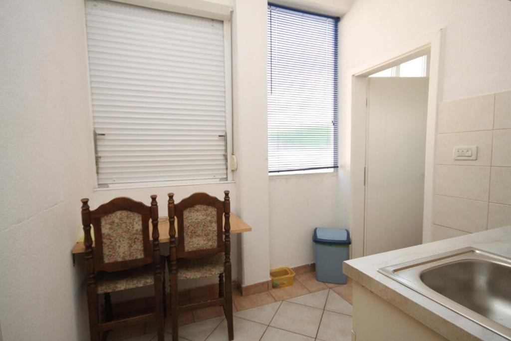 Koupelna v ubytování Apartments with a parking space Makarska - 6693