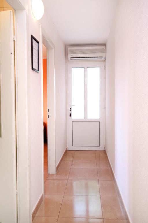 Fotografia z galérie ubytovania Apartments by the sea Podgora, Makarska - 6836 v Podgore