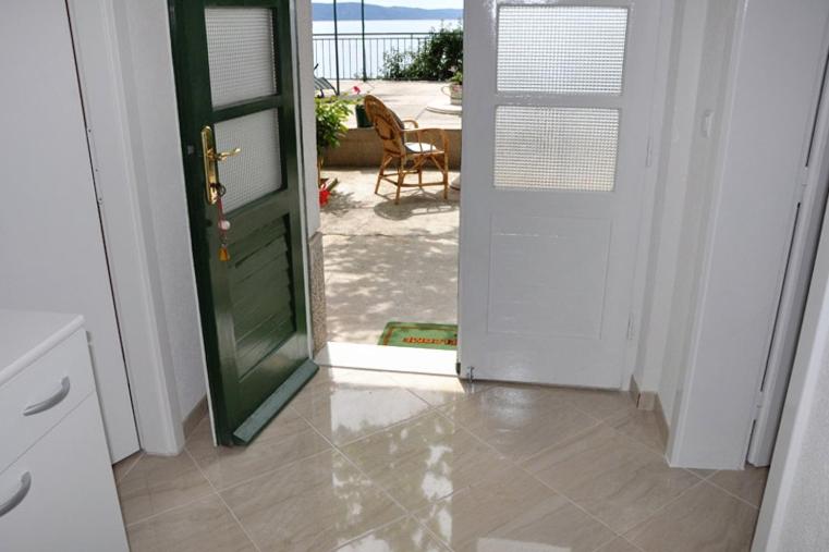 Fotografia z galérie ubytovania Apartments by the sea Podgora, Makarska - 6836 v Podgore