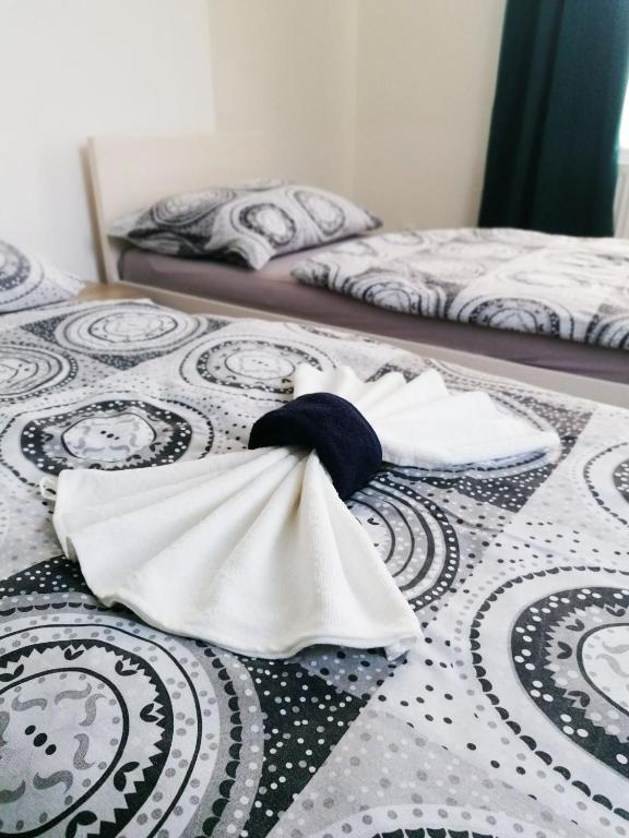 Postel nebo postele na pokoji v ubytování Apartmány Plzeň Zábělá 69