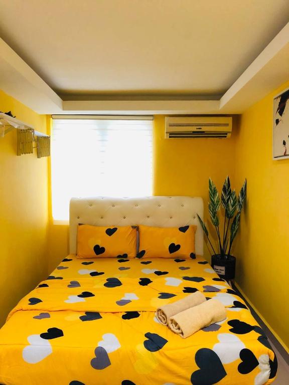 Postel nebo postele na pokoji v ubytování RD Legend Hotel