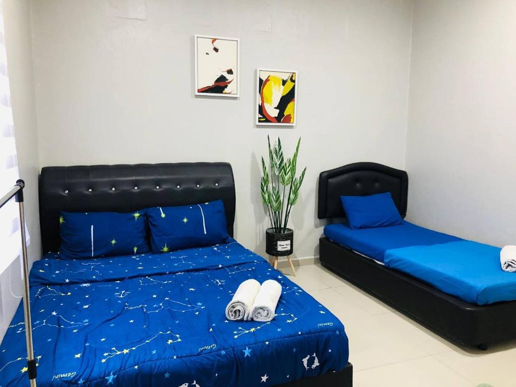 Postel nebo postele na pokoji v ubytování RD Legend Hotel