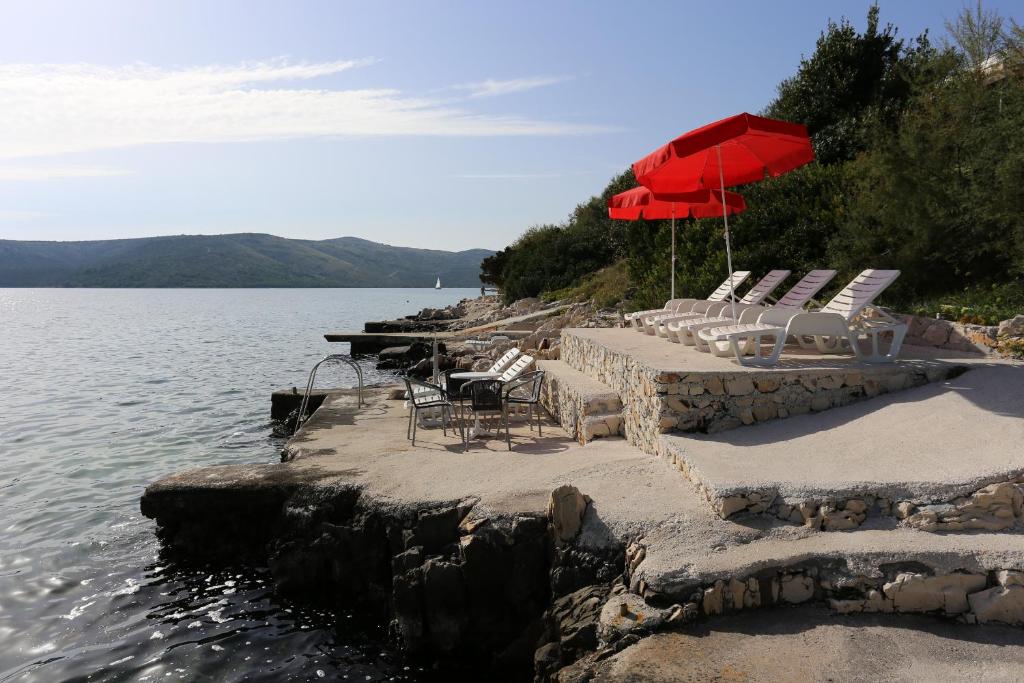 Fotografia z galérie ubytovania Seaside family friendly house with a swimming pool Seget Vranjica, Trogir - 10336 v Seget Vranjici