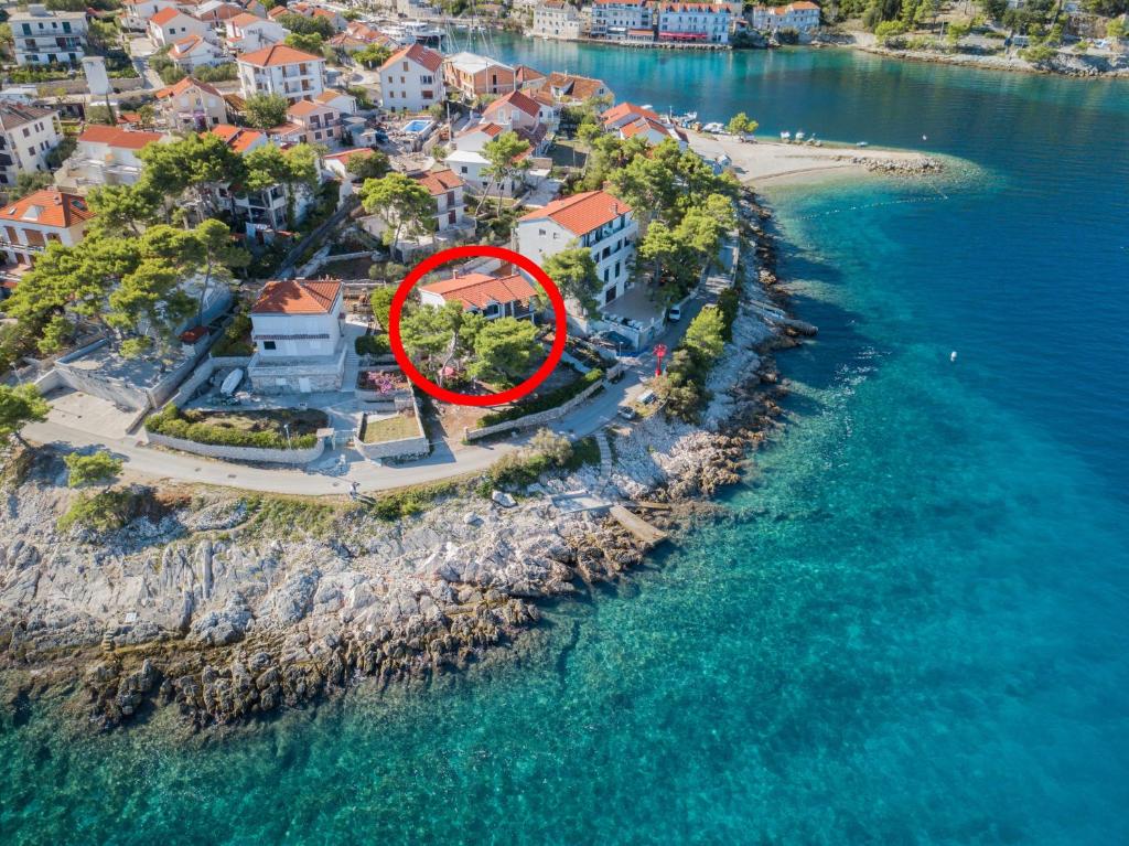 an aerial view of an island with a red circle at Apartments by the sea Stomorska, Solta - 5190 in Stomorska