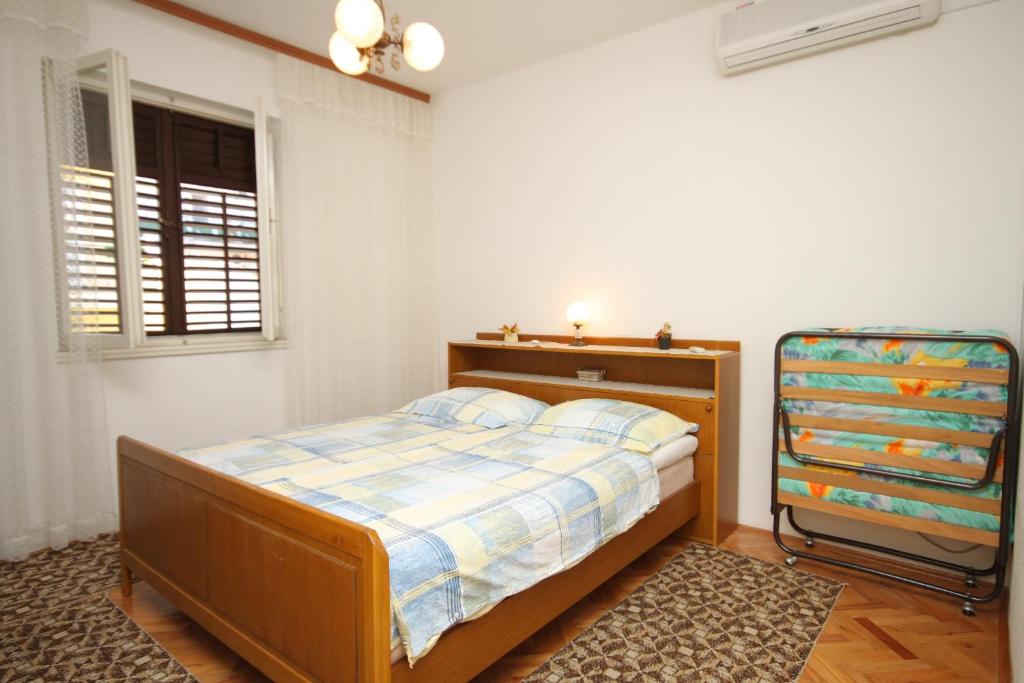 Posteľ alebo postele v izbe v ubytovaní Rooms with a parking space Makarska - 6778