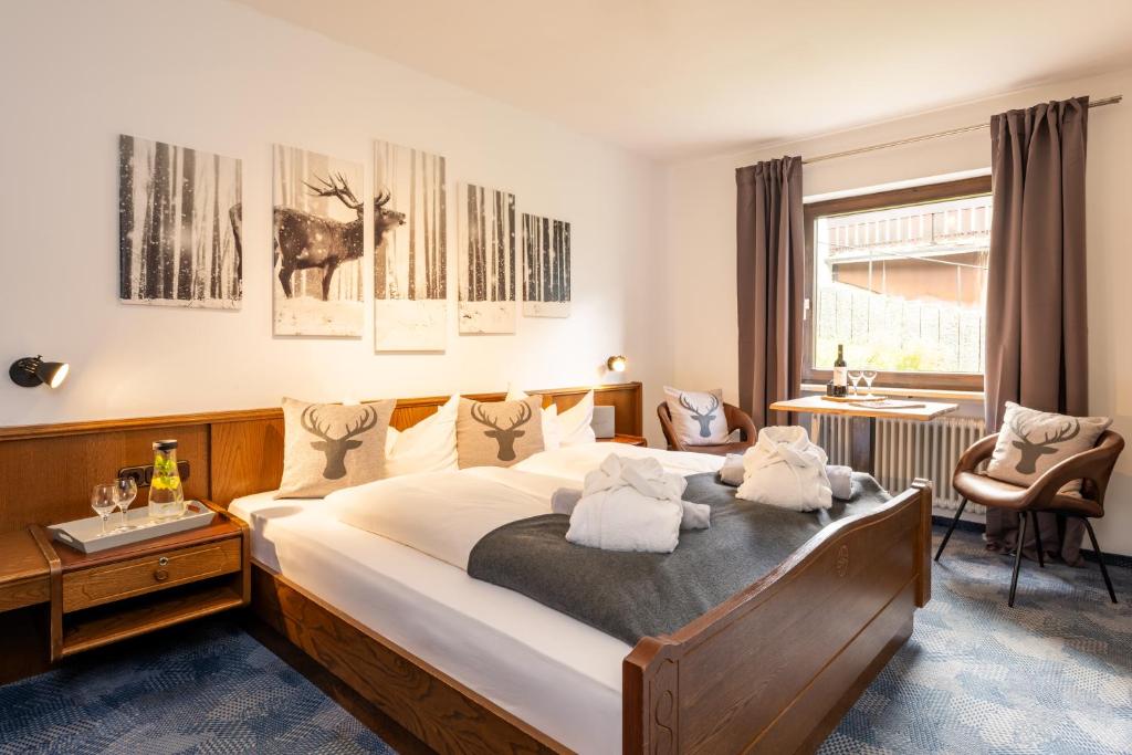 Postel nebo postele na pokoji v ubytování Hotel Tannhof