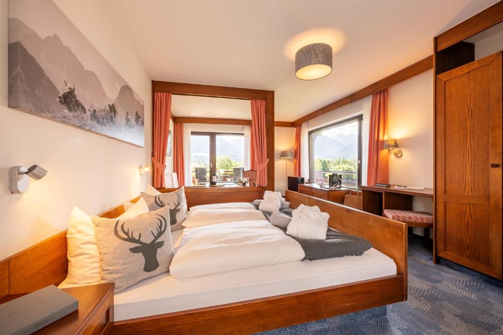 Postel nebo postele na pokoji v ubytování Hotel Tannhof