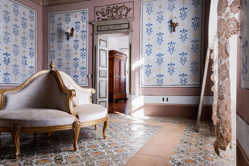 Dimora Ferraris a Cabras - Elegante B&B con giardino