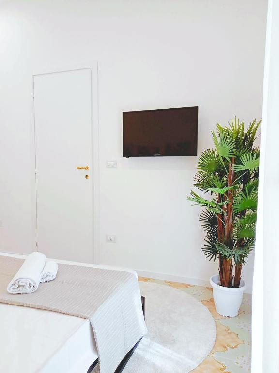 TV a/nebo společenská místnost v ubytování Home Sicily