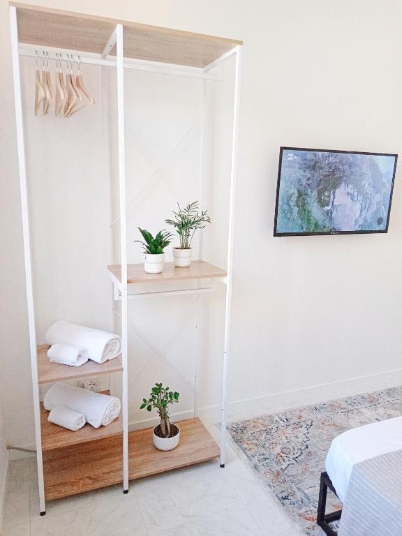 Postel nebo postele na pokoji v ubytování Home Sicily