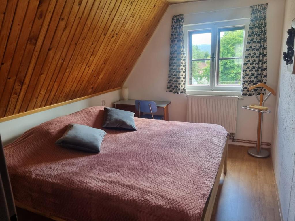 Postel nebo postele na pokoji v ubytování Stuga Horni Blatna