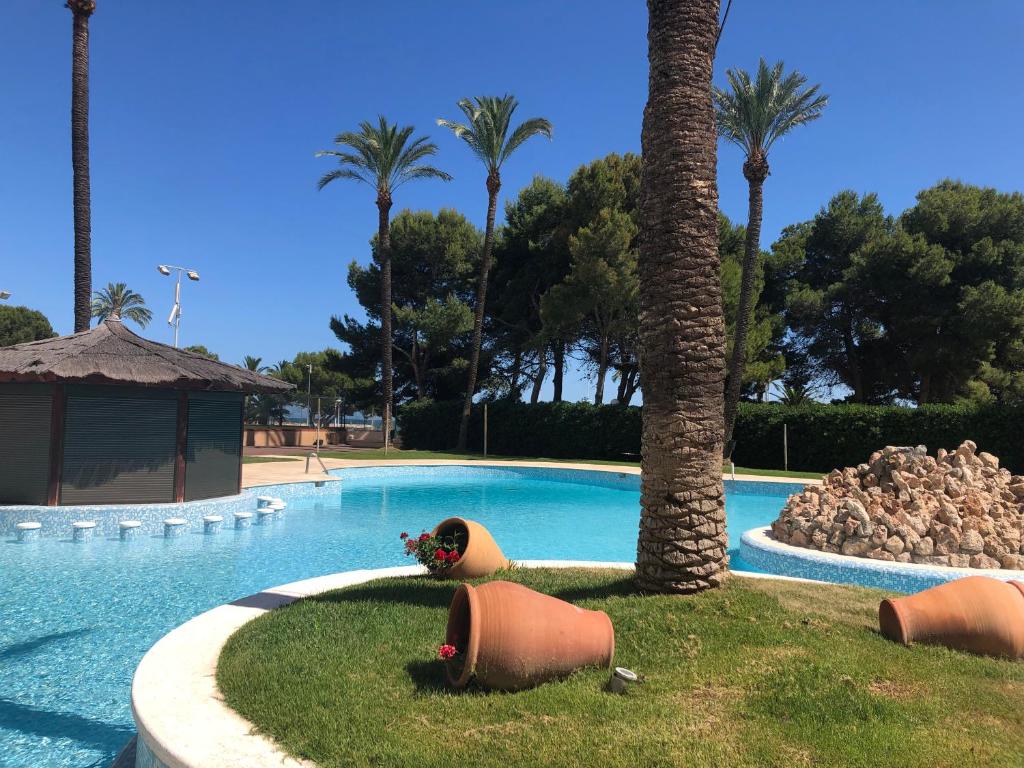 The swimming pool at or close to Cullera - Florazar II con piscina, tenis y club social