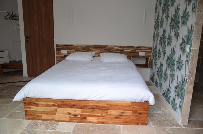 Posteľ alebo postele v izbe v ubytovaní Charmant logis neuf équipé/Piscine/SPA/Sauna/Gym